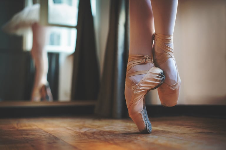 Portraits of beautiful balerina on pointe shoes